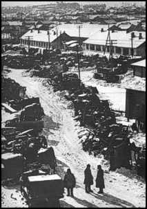 Soviet troops among abandoned German equipment